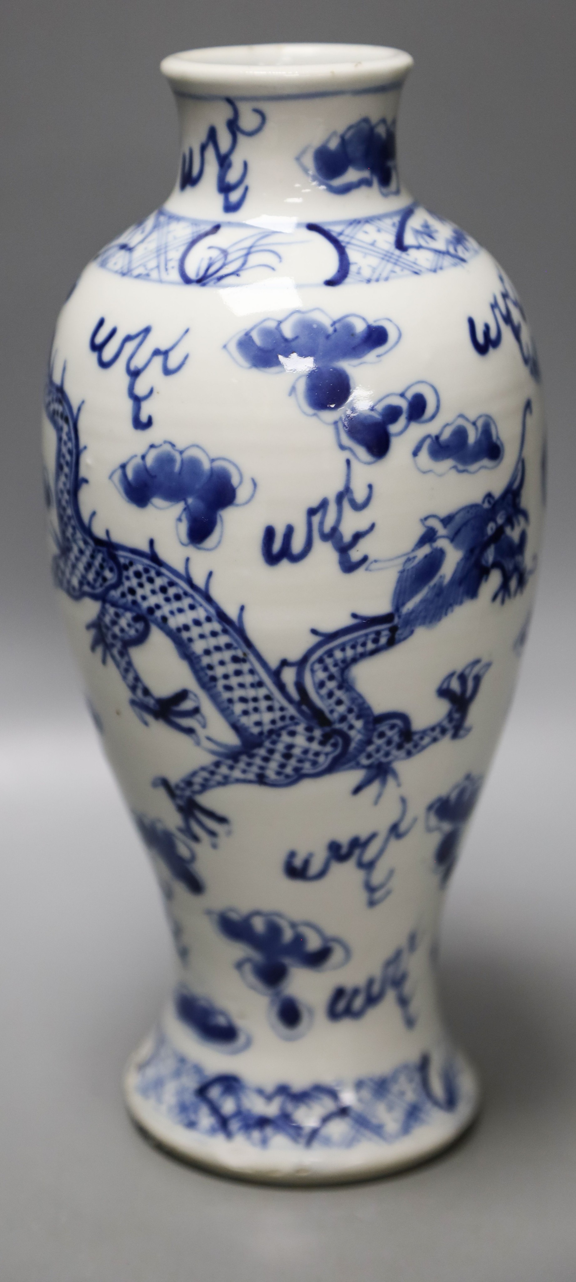 A 19th century Chinese blue and white dragon vase, 25cm